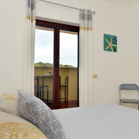 Апартаменты Casa Sheela Luminoso E Raffinato Ла-Маддалена